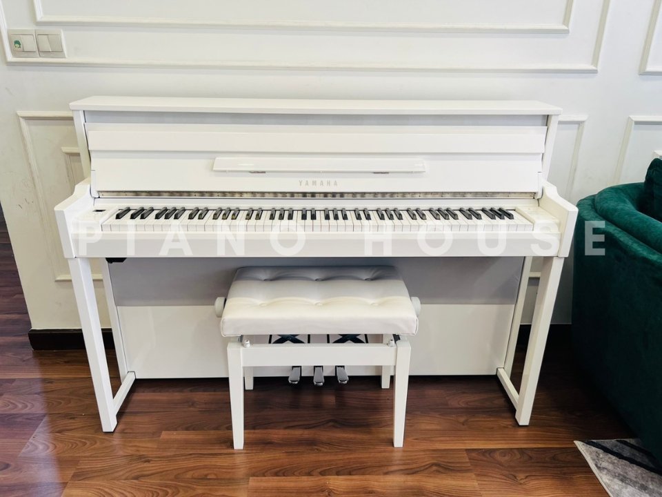 Bàn phím gỗ nguyên khối của đàn YAMAHA NU1 PBW với cơ chế action truyền thống