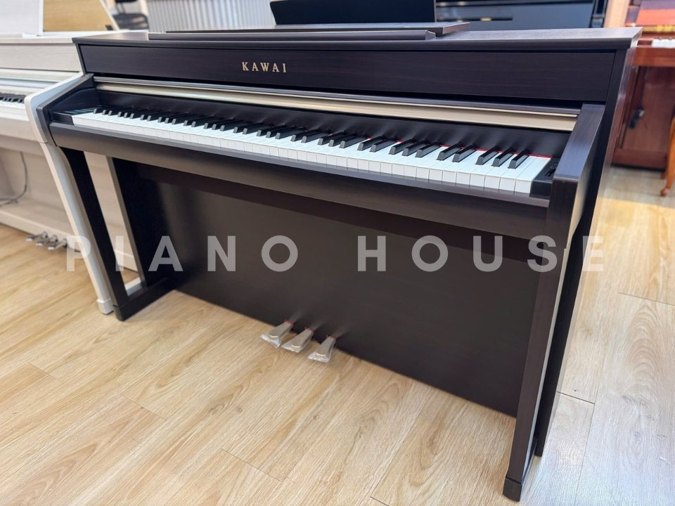 Đàn piano điện KAWAI CA98 R màu gỗ hồng cao cấp đặt trong phòng khách sang trọng