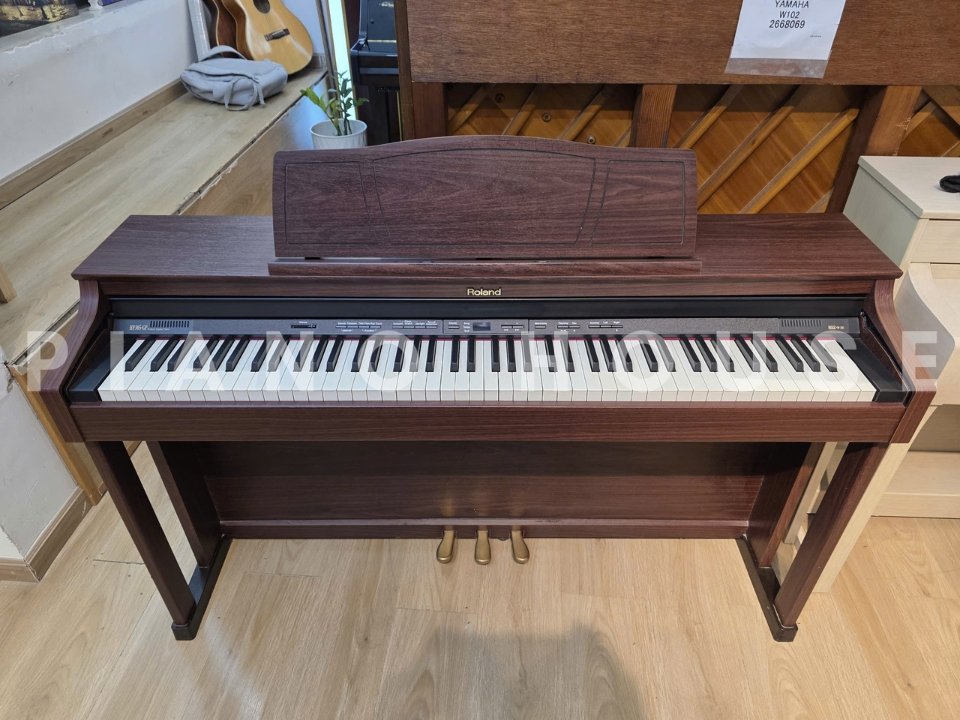 Chi tiết màu gỗ nâu Rosewood của ROLAND HP-305 GP